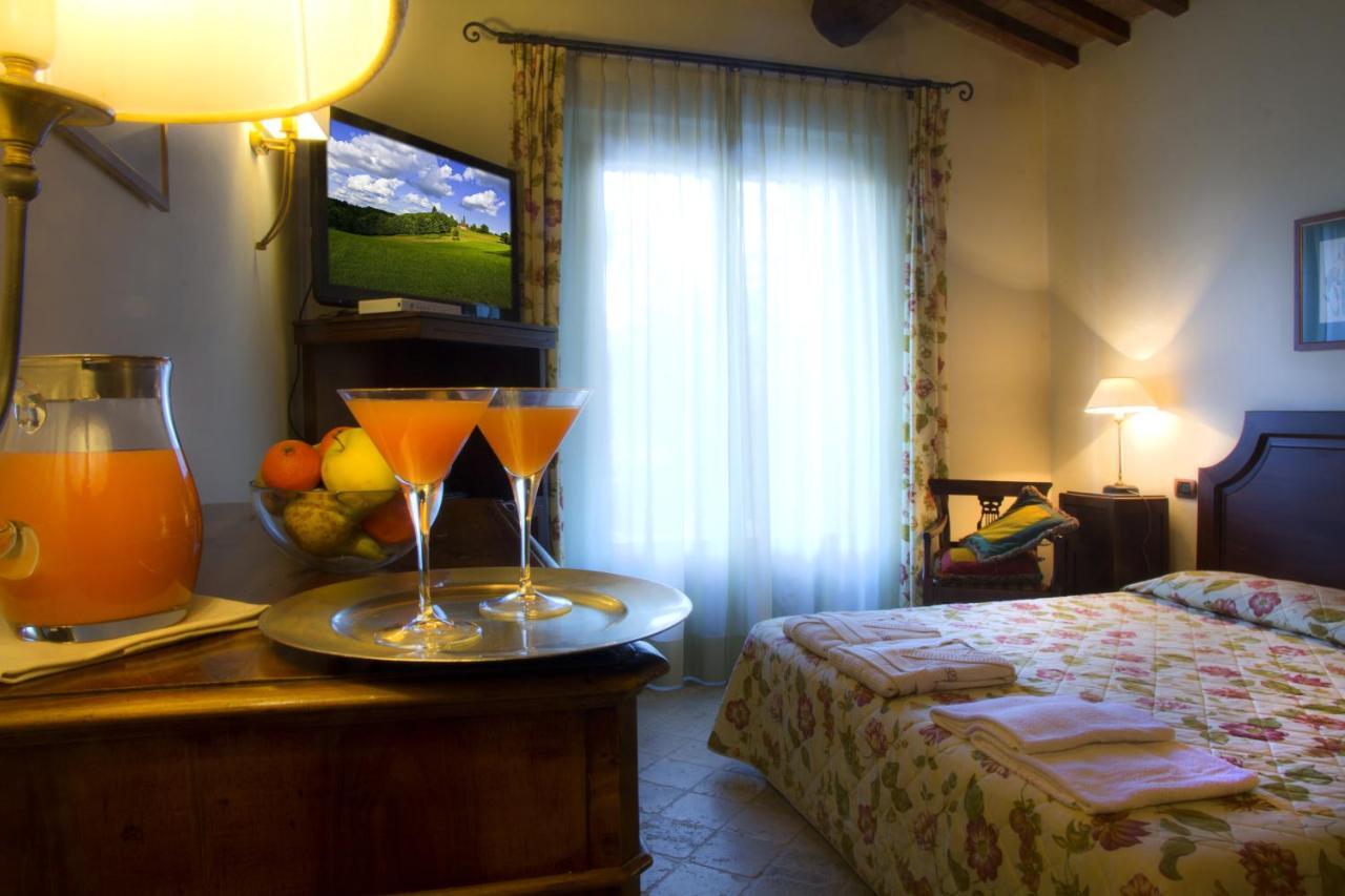 Logge Del Perugino; Sure Hotel Collection By Best Western Città della Pieve Oda fotoğraf